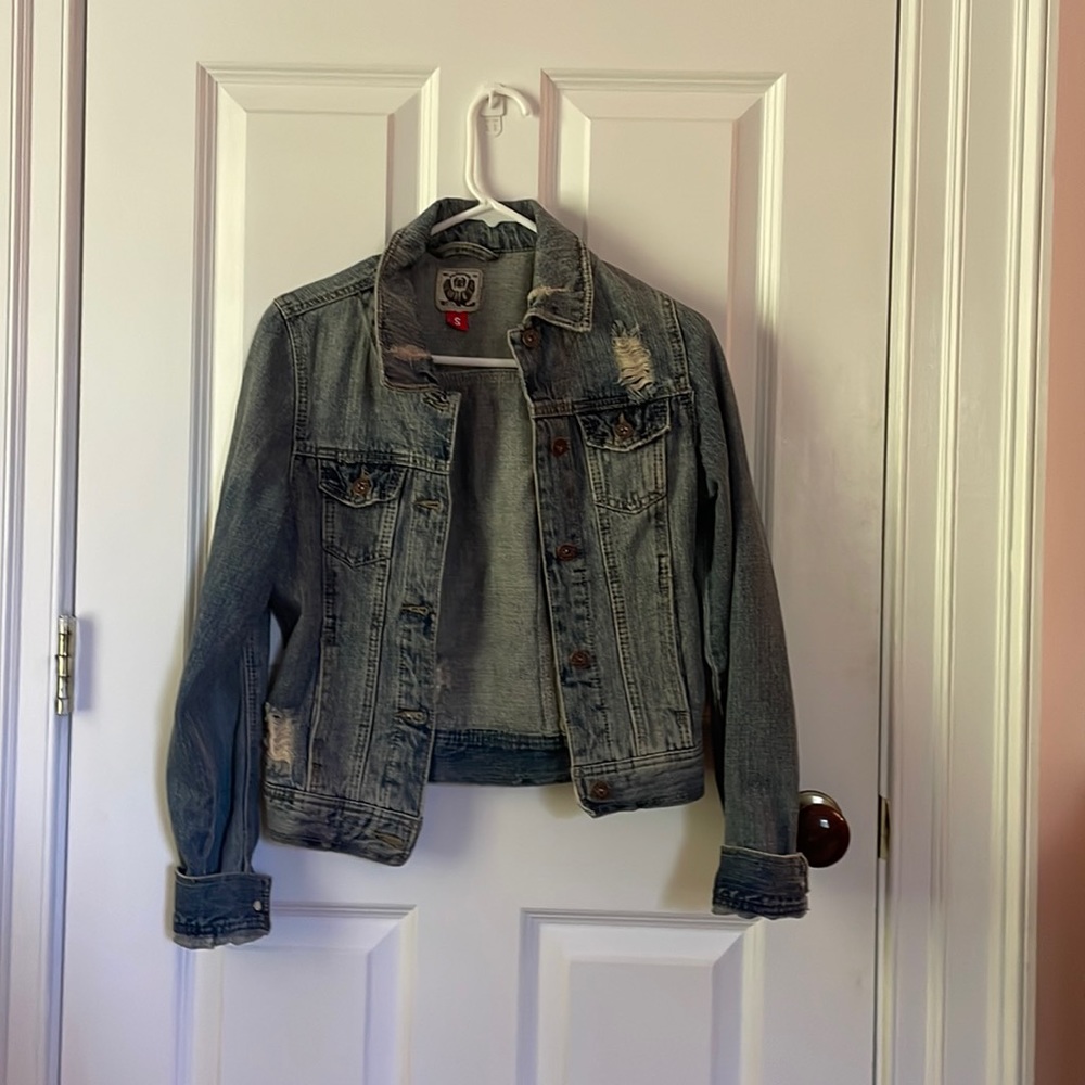 Distressed denim jacket